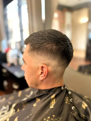Clean fade haircut by Ashlynn Ota