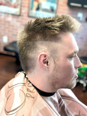 Textured fade with blonde highlights